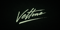 Glowing Veltone logo on a dark background