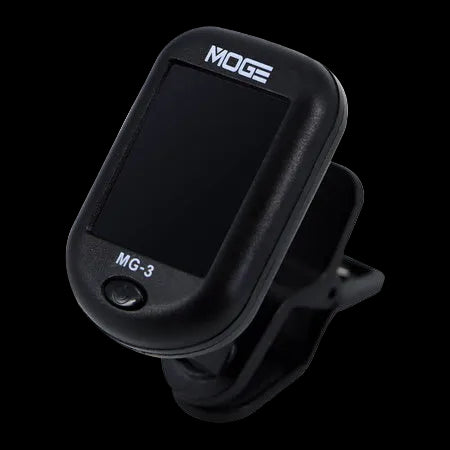 MOGE MG-3 digital clip-on tuner with a black plastic body, digital display screen, and adjustable mounting clip, shown on a plain white background.