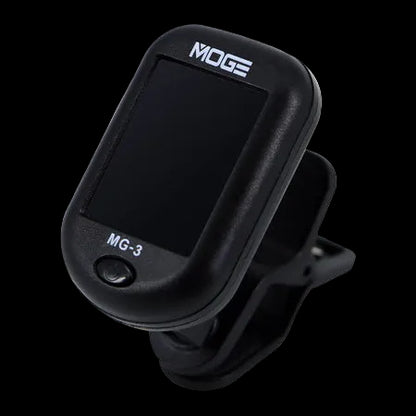 MOGE MG-3 digital clip-on tuner with a black plastic body, digital display screen, and adjustable mounting clip, shown on a plain white background.